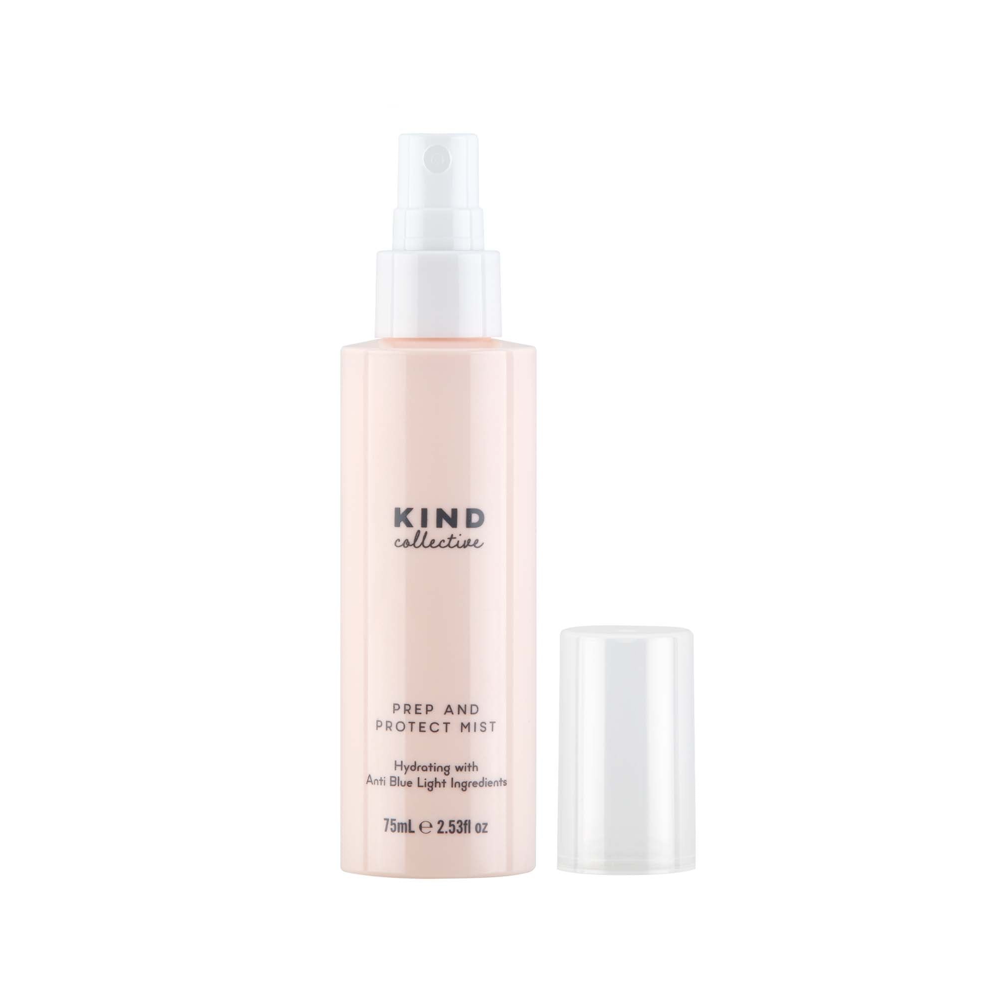 A bottle of KIND Collective Prep and Protect Mist in a pale pink colour with a white spray nozzle, shown next to its clear cap on a white background.